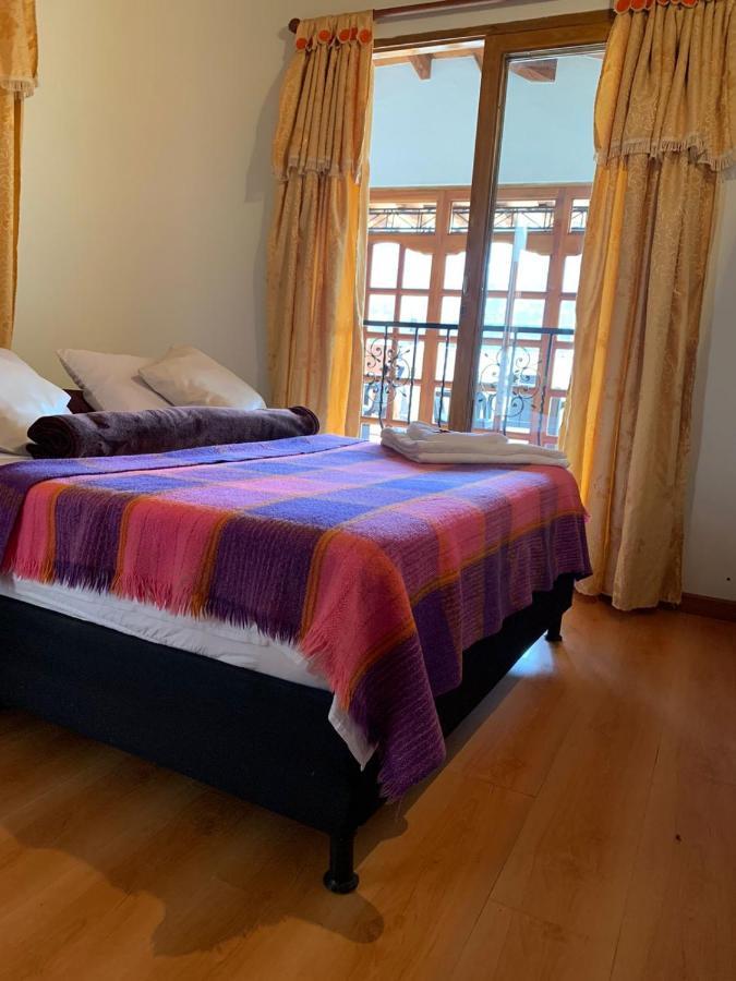 Casa Pastora Coworking Bed & Breakfast Guatapé Oda fotoğraf